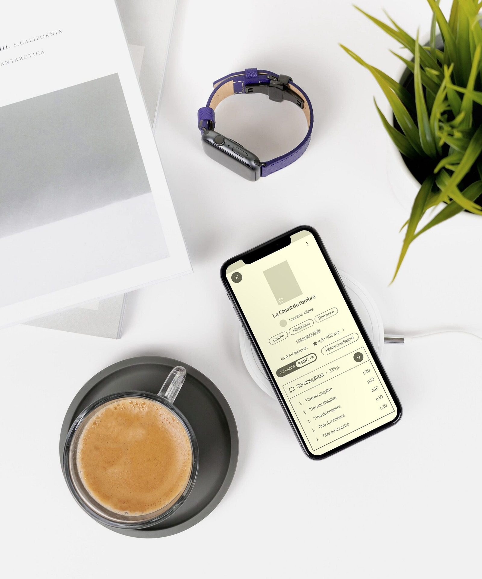 Téléphone sur une table avec l'application Plume Collective ouverte
